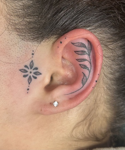Ear adornment, tattoo by Lily Spade, Dawnbringer Tattoo, Kansas City