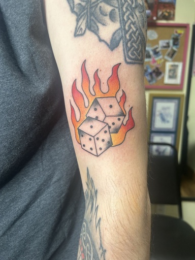 Traditional flaming dice, tattoo by Lily Spade, Dawnbringer Tattoo, Kansas City